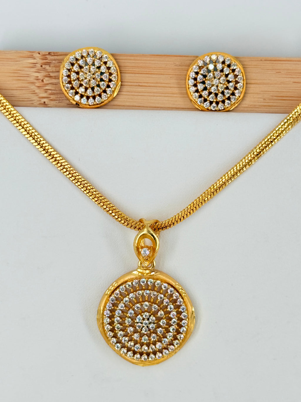 Gold Plated Round Spiral Pendant Set With Chain
