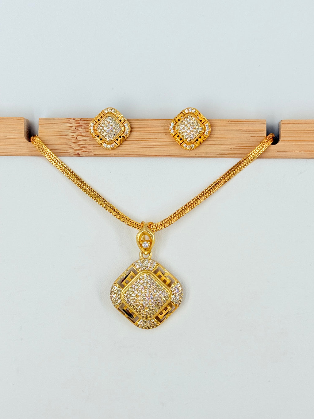Gold Plated Diamond-Shaped Stone Designer Pendant Set With Chain